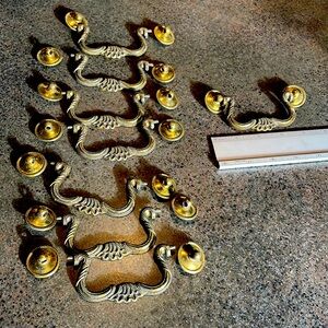 8 Antique Brass drawer pulls.